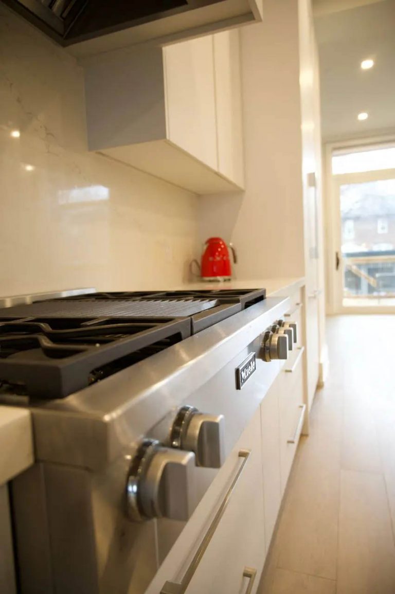 12. Kitchen stove in a custom home