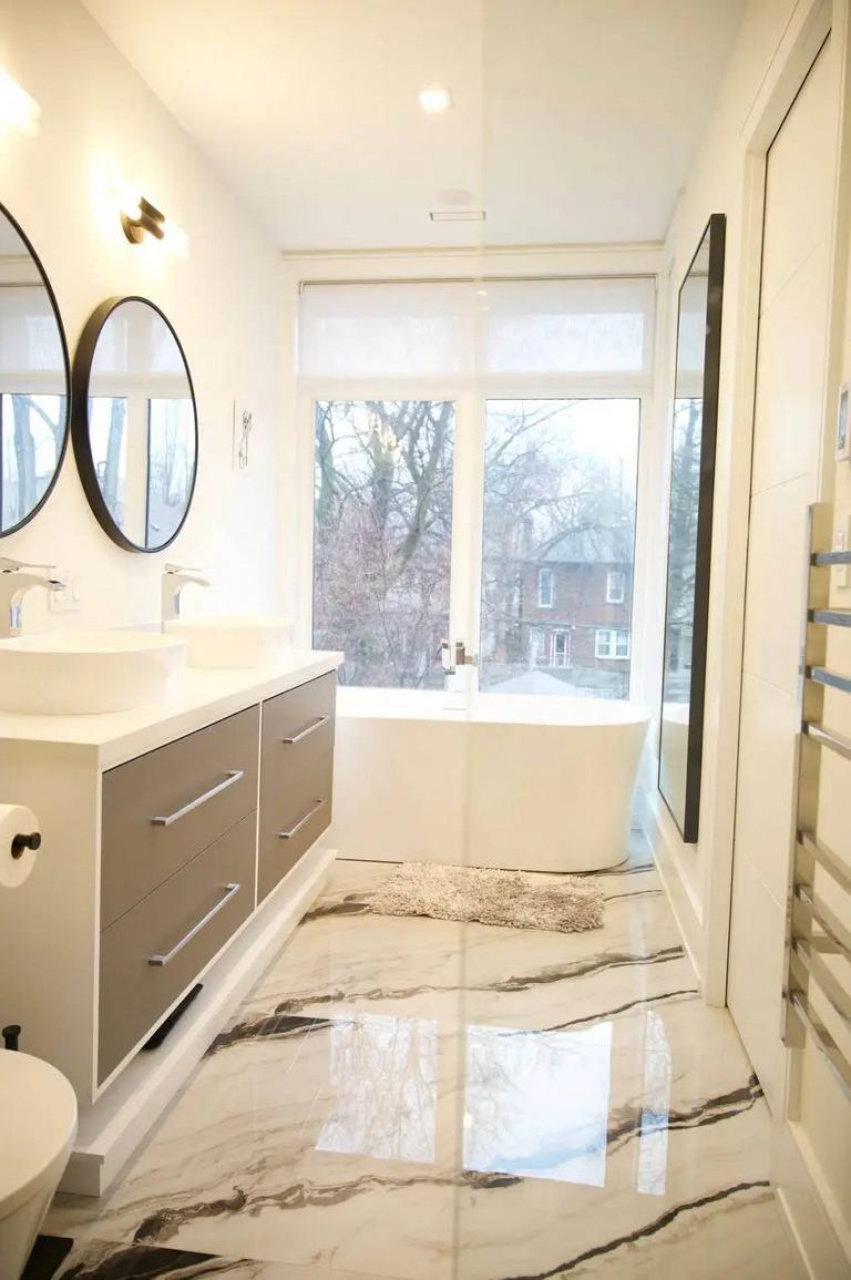 20. Master bathroom in a custom home with quartz flooring