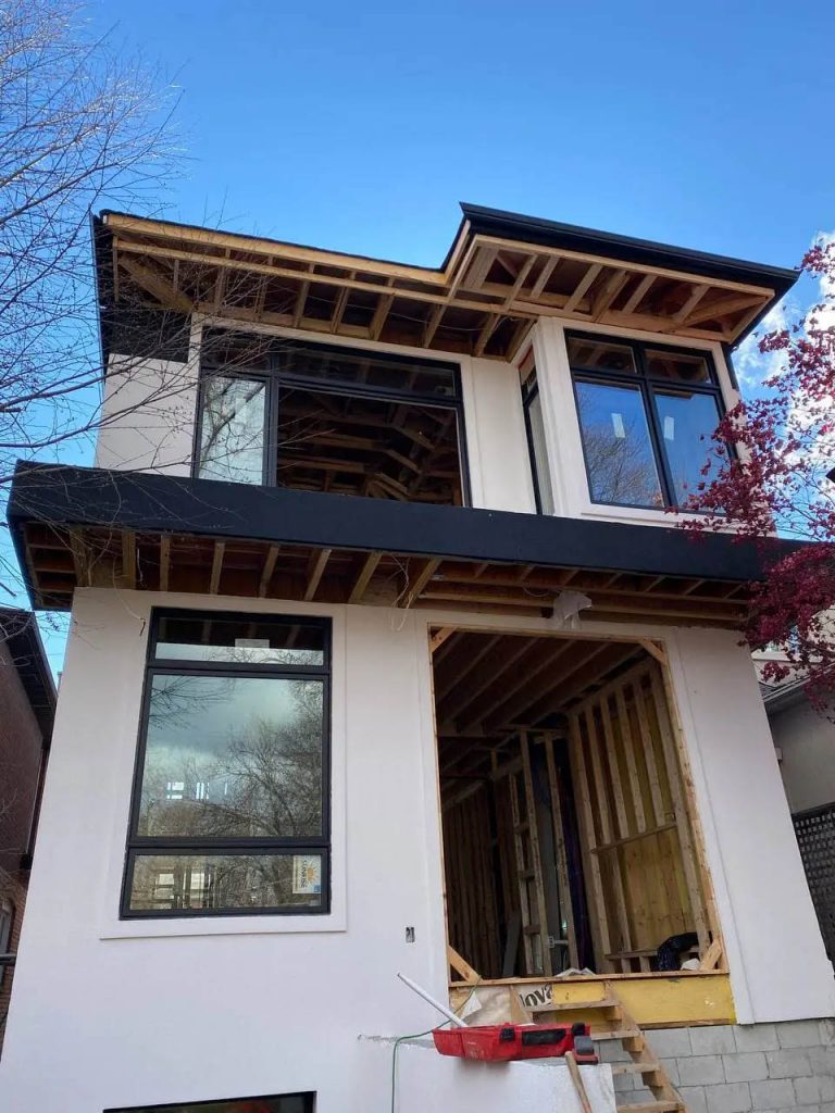 23. Custom Home Exterior in Construction