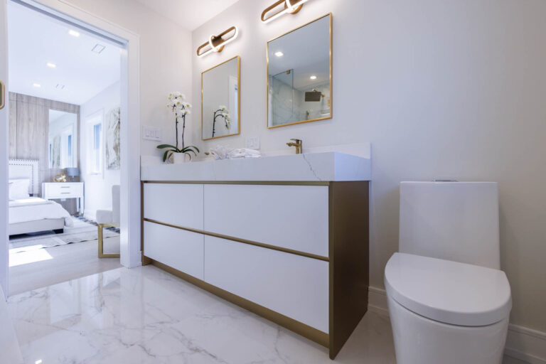 Bathroom-With-Stylish-Double-Sink-Vanity-And-Glass-Shower-Door