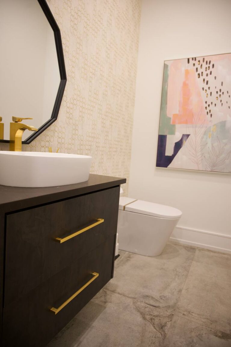 Modern-Bathroom-With-Brown-Vanity-White-Sink-Mirror-And-Wall-Art