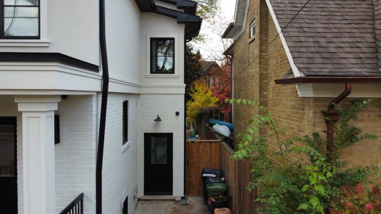custom-home-with-white-exterior-and-black-details
