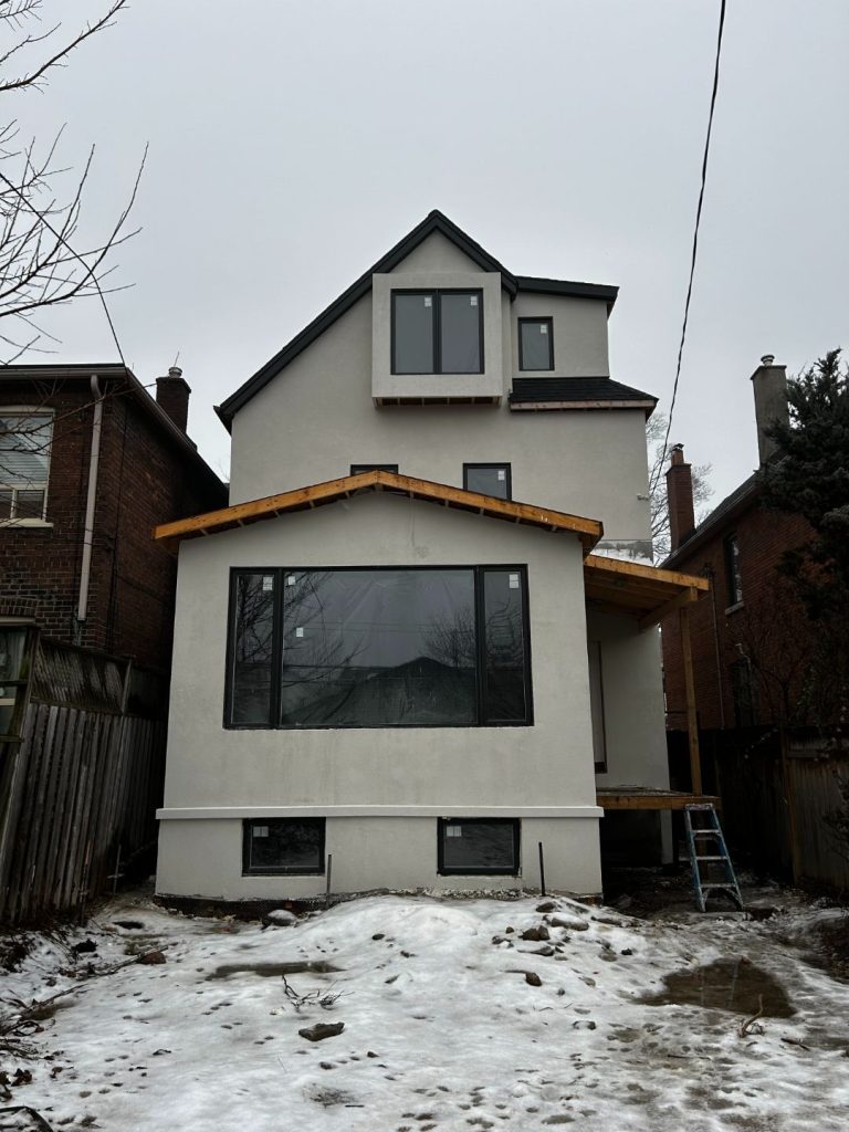 exterior renovation in process backyard view