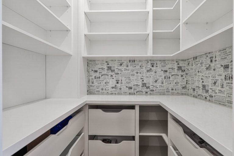 modern-butlers-pantry-with-vintage-newspaper-print-accent-wall