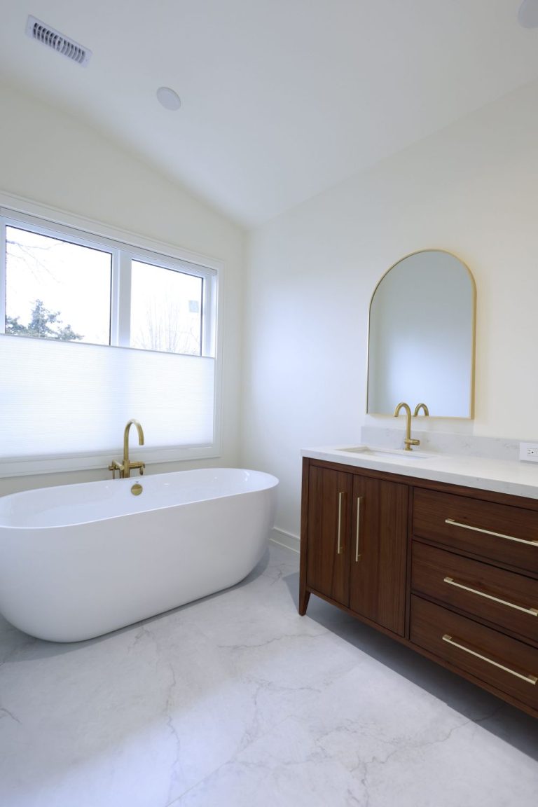 spa-like-master-bathroom-double-vanity-gold-arch-mirrors
