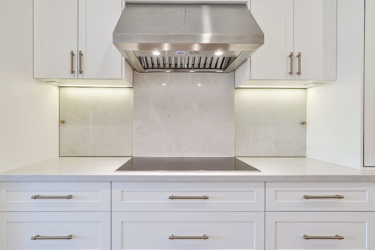 white-kitchen-cabinets-with-stainless-range-hood